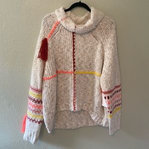 Urban Outfitters/ BDG cream knit sweatshirt with tassels